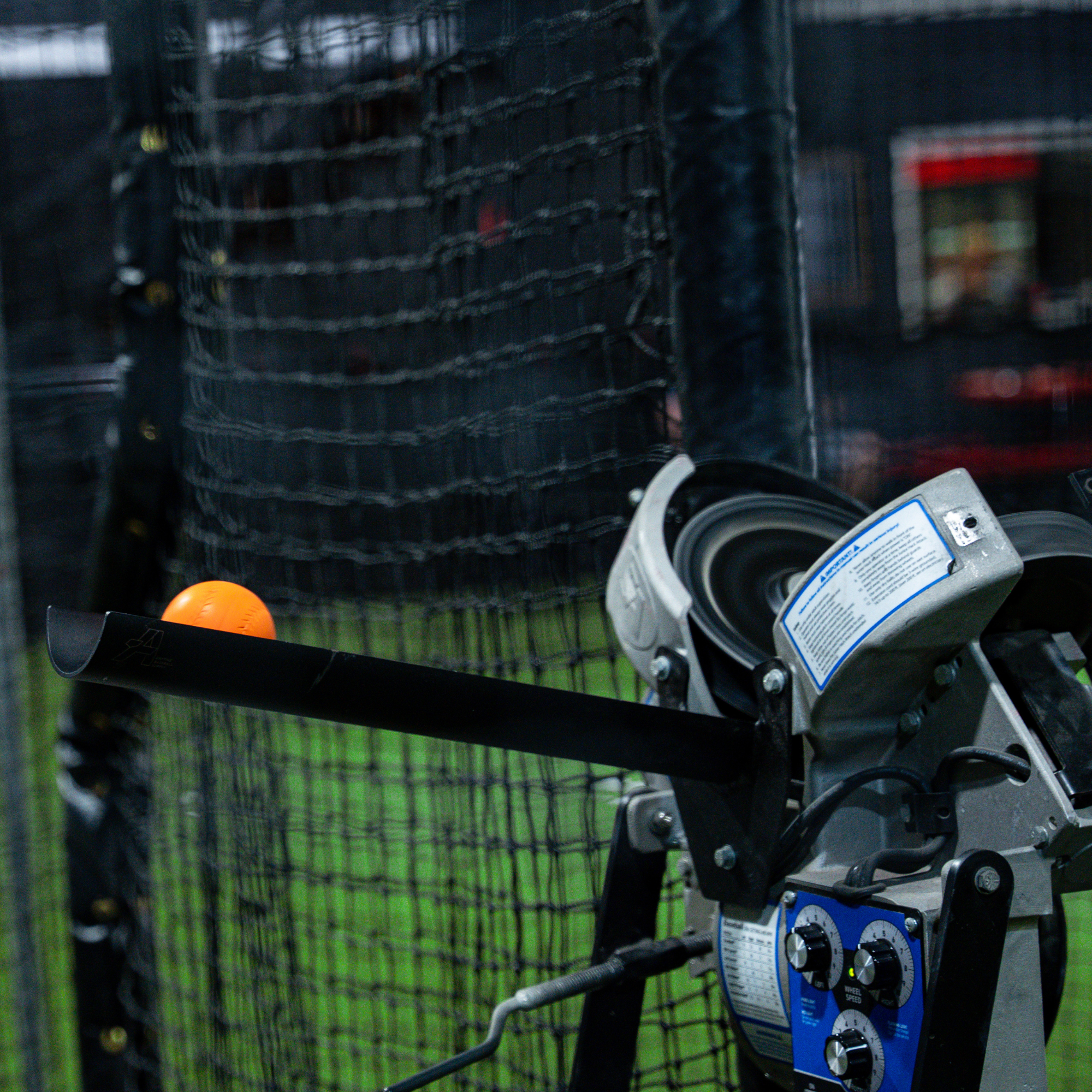 Jr. Hack Attack Baseball Pitching Machine With Extended Timing Chute Close Up