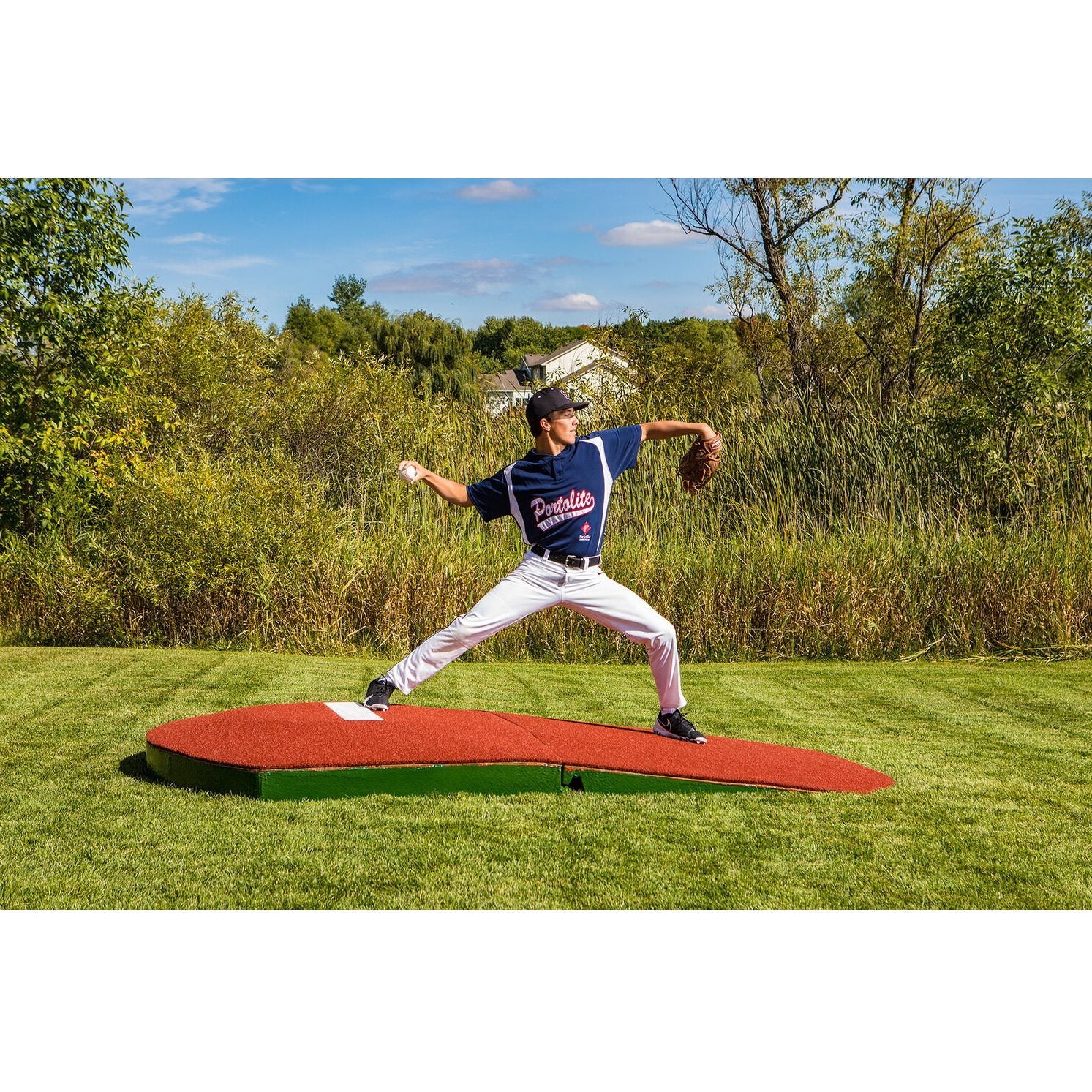 Portolite 10" Two-Piece Portable Pitching Mound red side view pitcher on mound