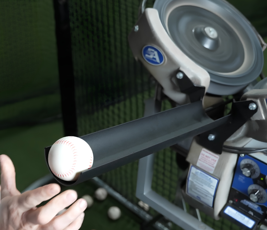 A ball rolling down the timing chute into the Hack Attack's wheels