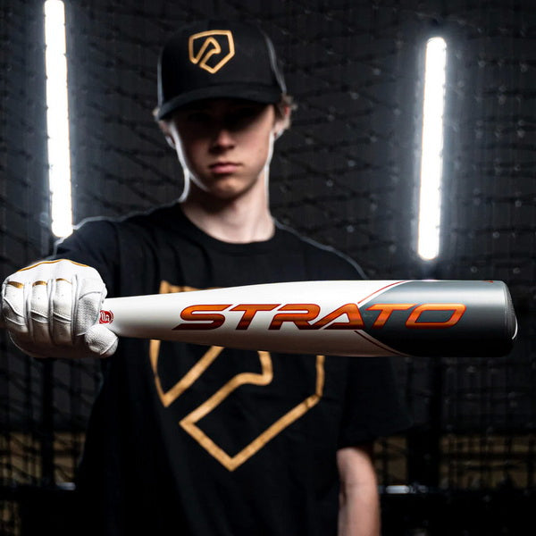 Axe Bat Strato (-10) Alloy Baseball Bat - 2023 player holding mid section