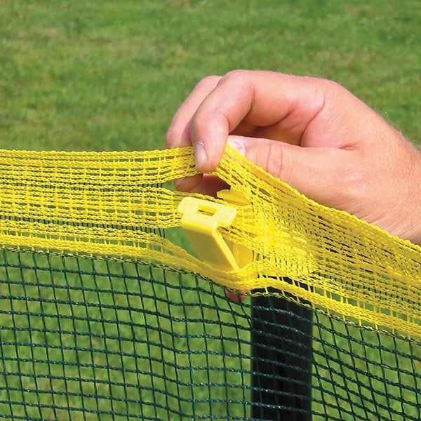 Grand Slam In-Ground Baseball Outfield Fencing (10' Spacing) With A Hand Holding The Net Attached To The Latch