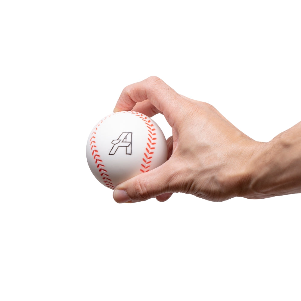 VeloMax Foam Pitching Machine Balls with Sunken Seams White On Hand