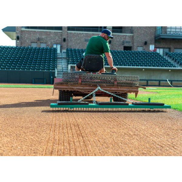 Weighted Nail Drag for Baseball Fields In Use