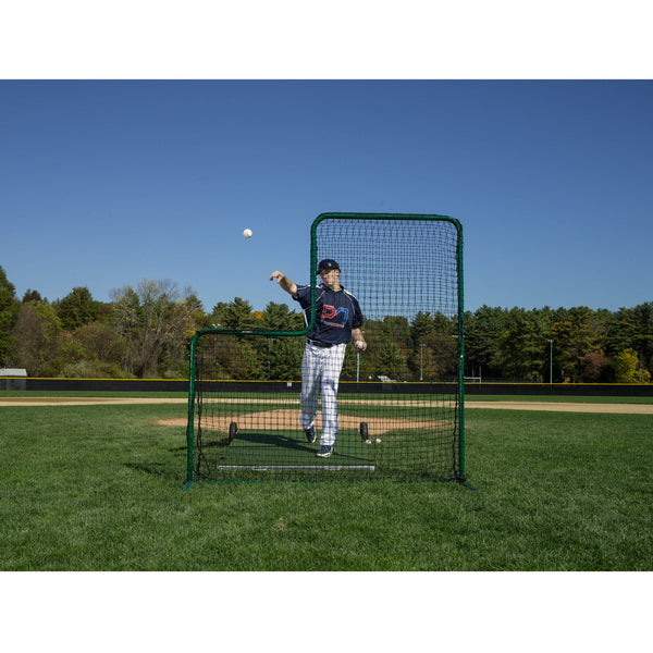 6" Portable Pitching Platform With Wheels Front View With Player Behind The L Screen
