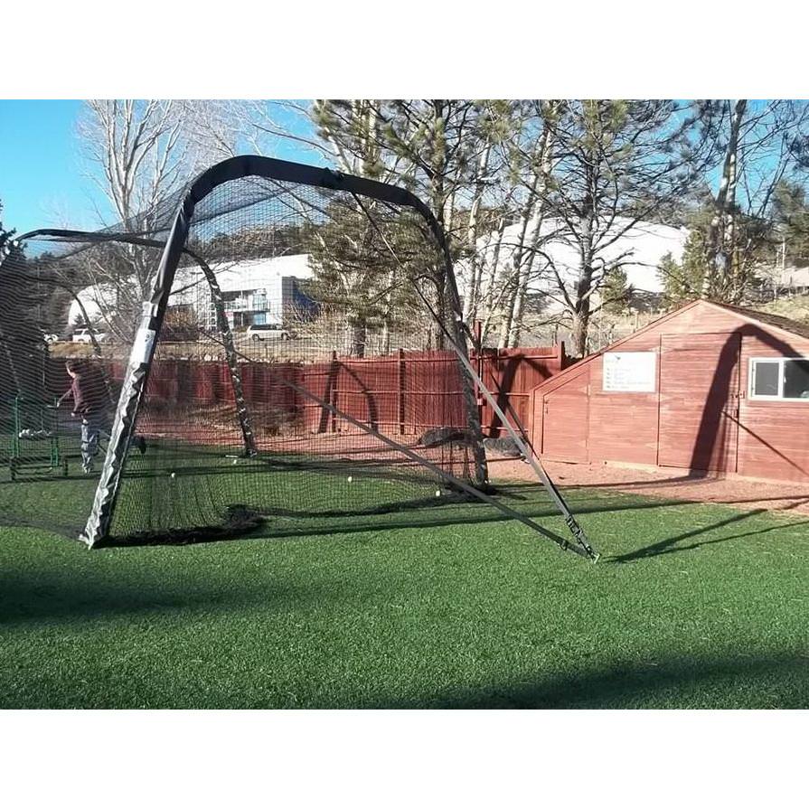 BATCO Indoor and Outdoor Foldable Batting Cage with Net #42 Braided Nylon anchored on backyard view