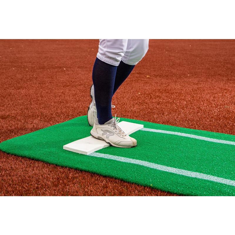 Paisley's Ultimate Spiked Softball Pitching Mat green standing on pitching rubber