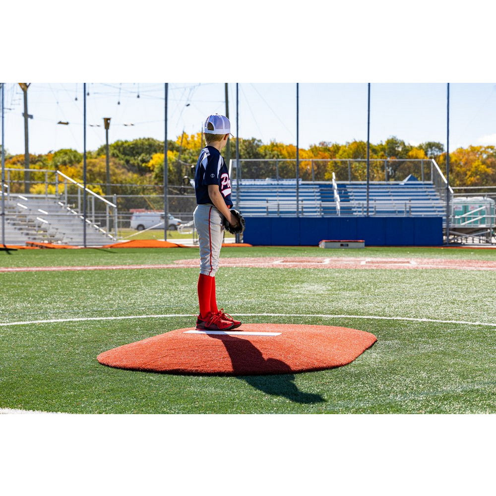 PortoLite 6" Full-Size Youth League Portable Pitching Mound red rear view player standing