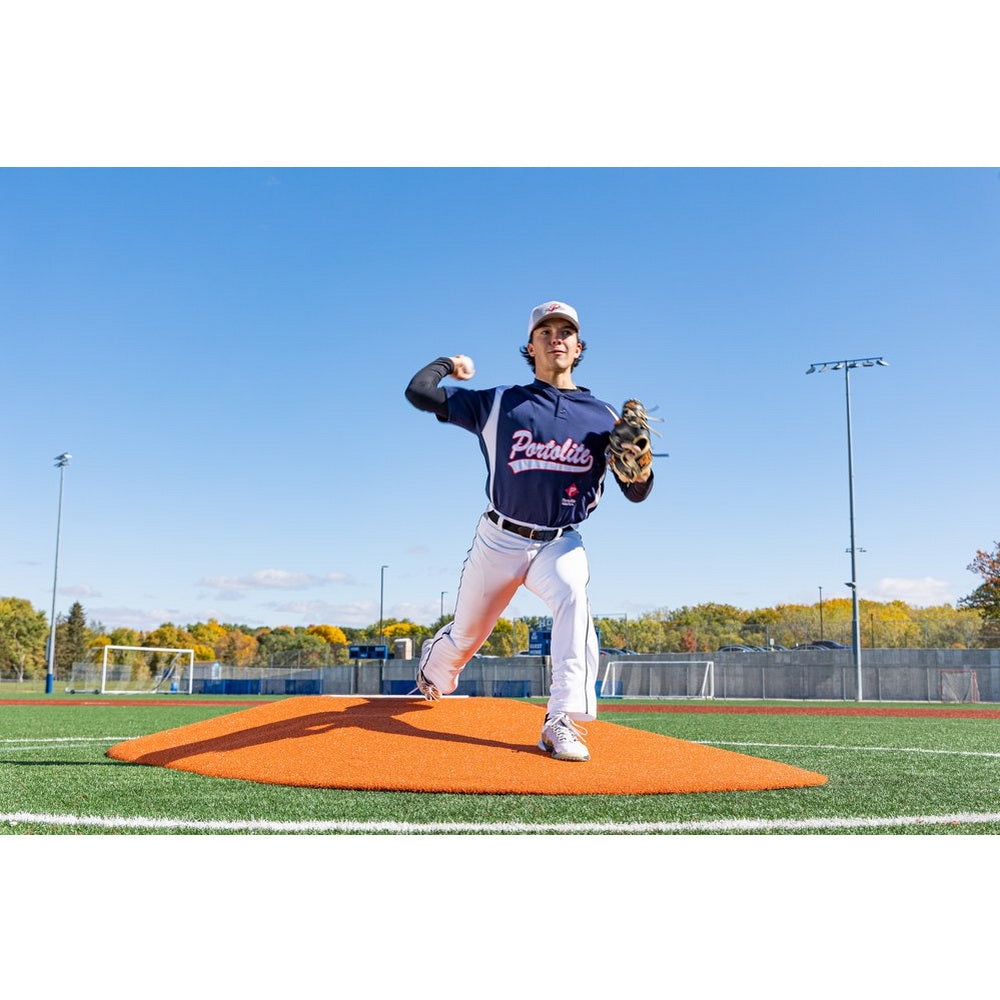 PortoLite Two-Piece 10" Portable Pitching Mound clay font view player pitcher on mound