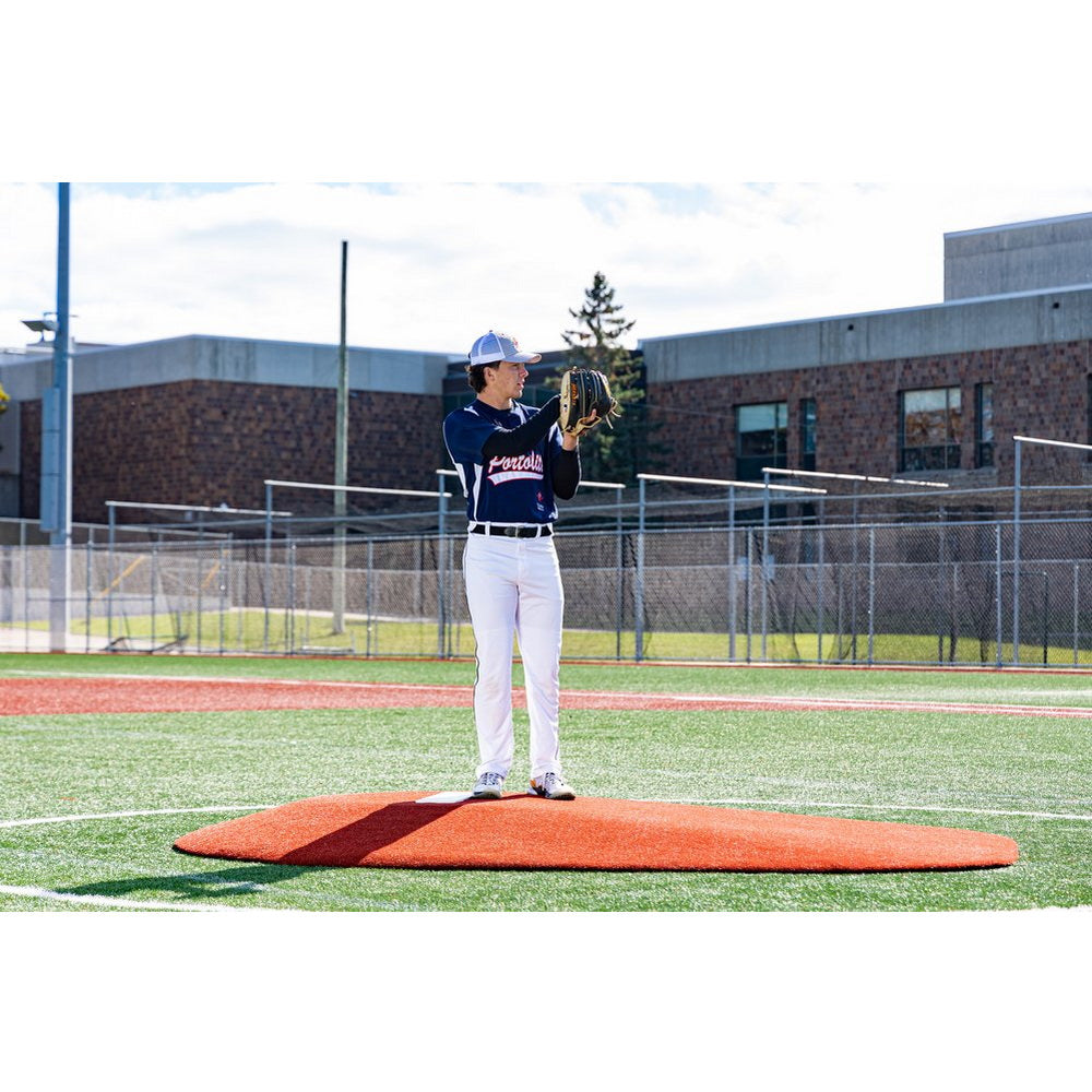 Portolite 10" Full Length Portable Pitching Mound for High School side view player standing