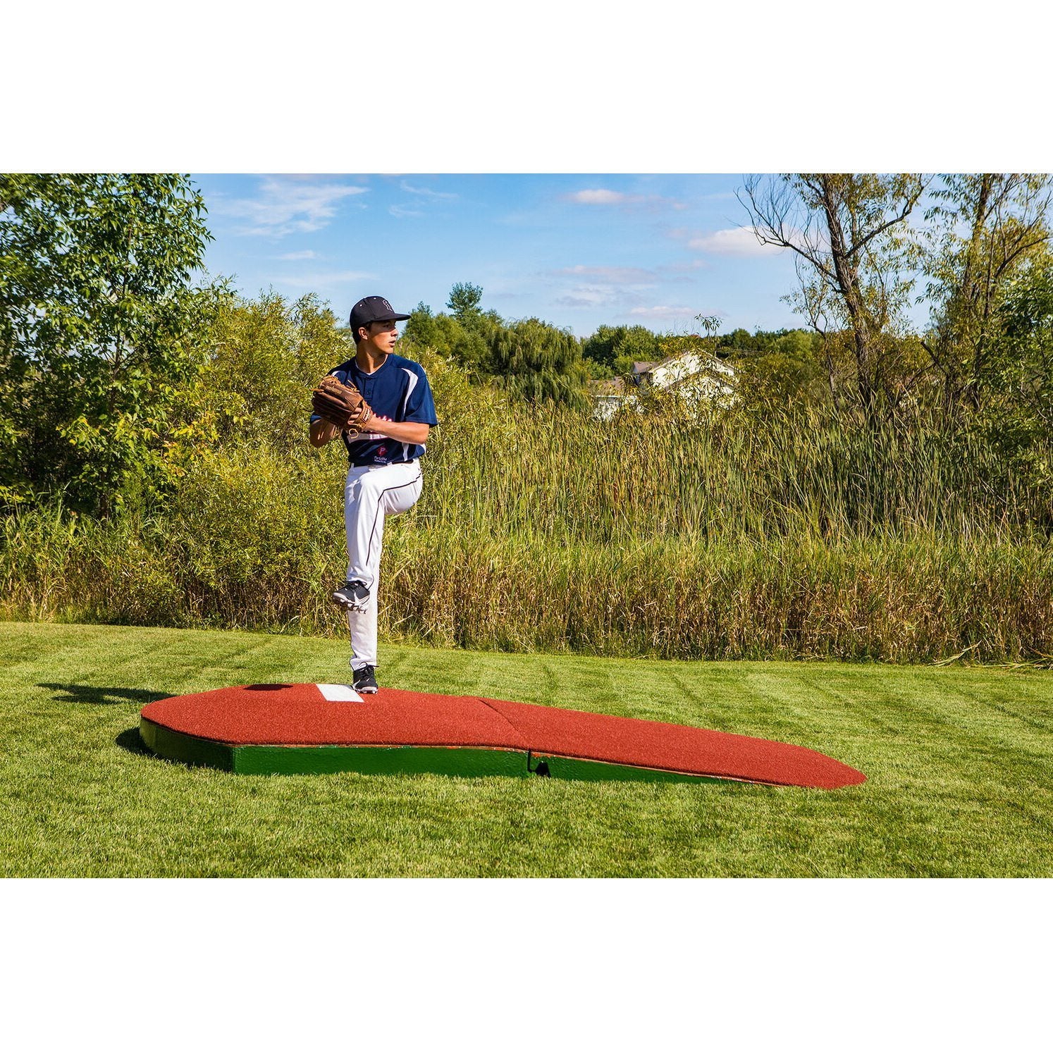 Portolite 10" Full Size 2-Piece Portable Practice Pitching Mound red pitcher standing on mound