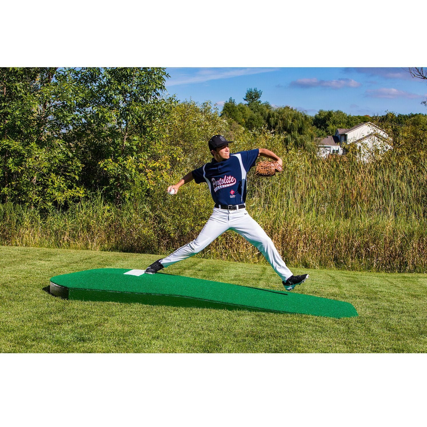Portolite 10" Portable Practice Pitching Mound green side view pitcher on mound