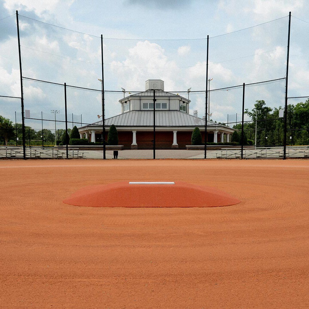 Senior League 10" Portable Game Pitching Mound clay far view on field