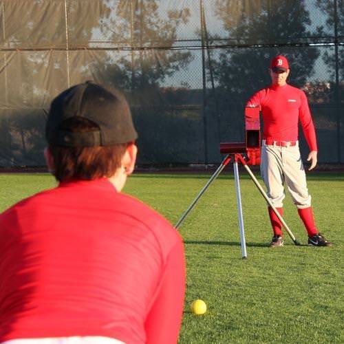 Softball 12 Inch Slow Pitch & Fast Pitch Pitching Machine on the Field