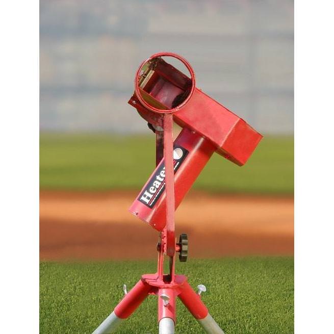 Heater Sports Pro Real Curveball Pitching Machine on field close up view