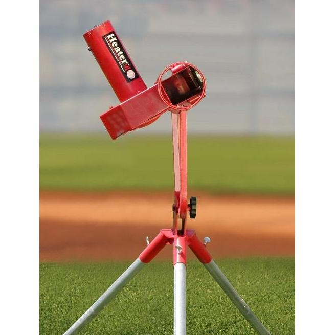 Heater Sports Pro Real Curveball Pitching Machine on field tilted view