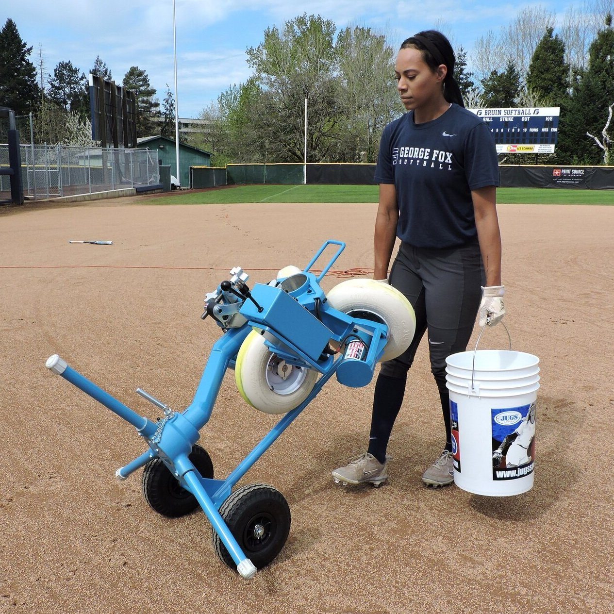 Jugs BP®3 Pitching Machine for Softball Being Transported