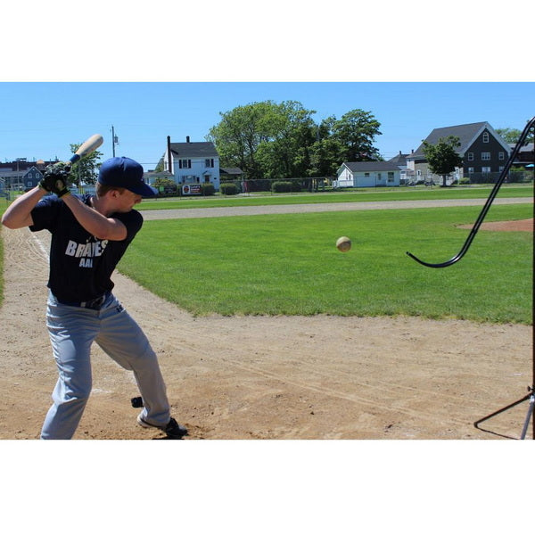 Louisville Slugger Soft-Toss Pitching Machine  With Player